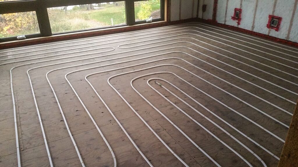 Installation de chauffage rayonnant pour plancher Uponor PEX